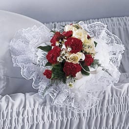 Red and cream rose bouquet with lace wrapping