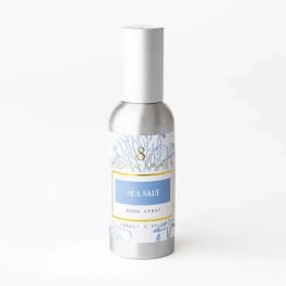 Bottle of sea salt room spray with a white cap