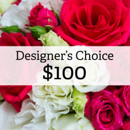 Pink and white roses with a "Designer’s Choice $100" label
