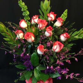 Dozen roses plus orchids