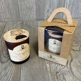 Two packaged candles in brown containers with wooden lids