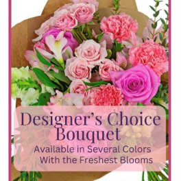 Pink mixed flower bouquet wrapped in brown paper