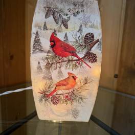 Decorative winter lamp with cardinals and pinecones