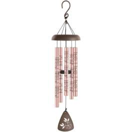 Hanging wind chime with pink tubes and a brown top