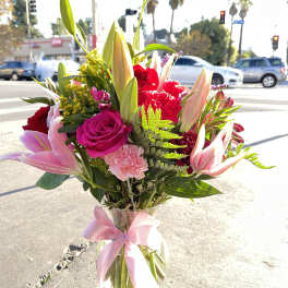 Lily and pink Roses plus other flowers