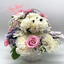 Pink and white flower basket with a Happy Mother's Day topper