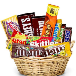 Basket filled with assorted candy bars and chocolate treats