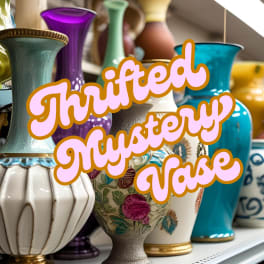 Colorful decorative vases arranged on a shelf with "Thrifted Nursery Vase" text overlay