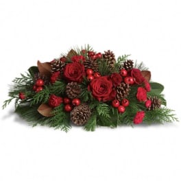 Red roses with pinecones and evergreen accents