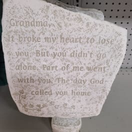 Decorative memorial stone with a sympathy quote