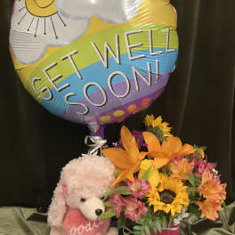 Get well balloon with a teddy bear and bright mixed flower arrangement
