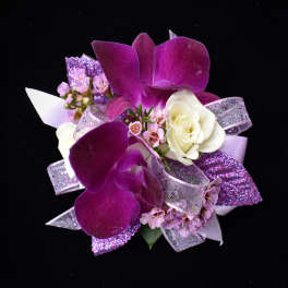 Purple orchid corsage with white rose and glitter ribbon