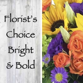Bright mixed bouquet with sunflowers, roses, and purple daisies