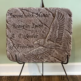 Decorative plaque with an eagle and the words "Served with Honor"