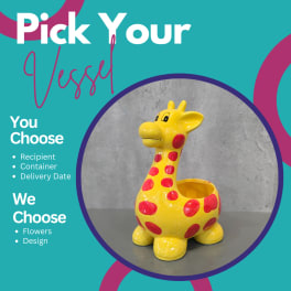 Yellow giraffe-shaped planter with red spots