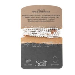 Beaded bracelet on a display card with text