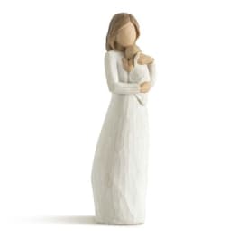 Wooden figurine of a woman holding a child