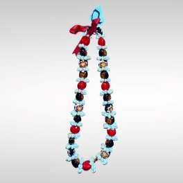 A red, black, and white beaded floral lei on a plain background.