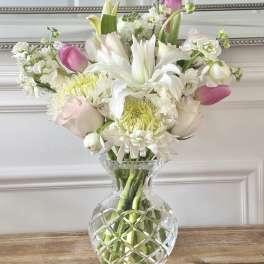 Pink and white mixed bouquet in a clear glass vase