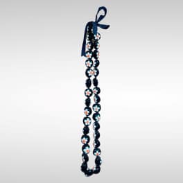 Black with white flowers Kukui Nuts Lei