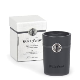 Black candle in a matte container with a matching box