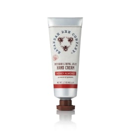Tube of hand cream with bee graphics and a brown cap