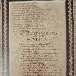 Framed wall hanging with the poem "Footprints in the Sand"