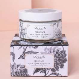 Jar of body butter on a floral-patterned box