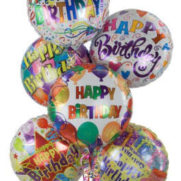 Cluster of colorful birthday balloons with printed messages