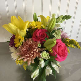 Mixed bouquet with pink roses, yellow lilies, and chrysanthemums
