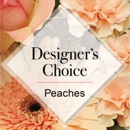 Peach and white mixed flowers with a diamond label reading 'Designer’s Choice Peaches' in the center