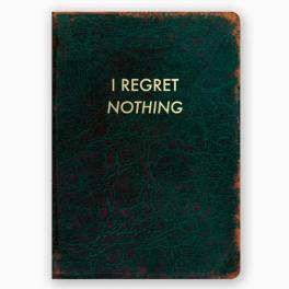 Dark card with the words "I REGRET NOTHING"