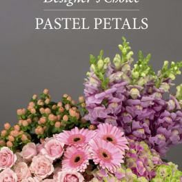 Pastel pink and purple flowers arranged beneath the words "Designer’s Choice Pastel Petals"