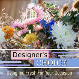 Mixed bouquet with pink, white, yellow, and blue flowers