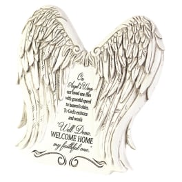 White angel wings plaque with memorial text