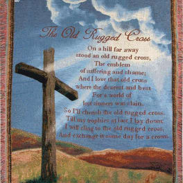 Tapestry with a wooden cross and printed poem against a blue sky