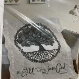 Quilted throw pillow with a tree and Psalm 46:10 text