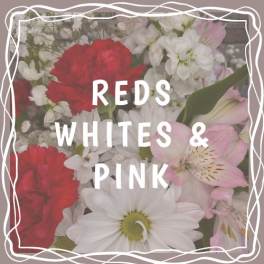 Mixed bouquet of red, white, and pink flowers