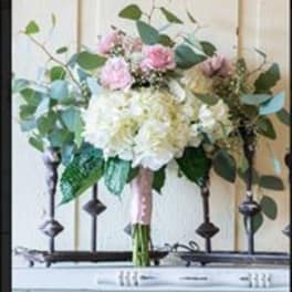 Pink and white bouquet with eucalyptus and a pink ribbon wrap