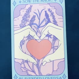 Illustrated hands forming a heart around a pink heart with lavender flowers