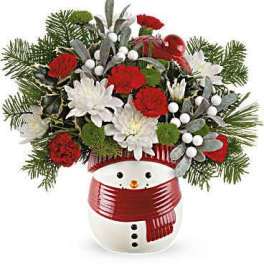 Snowman planter with red and white flowers