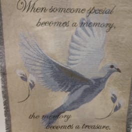 Decorative memorial blanket with a dove and sympathy quote