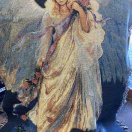 Tapestry of an angel holding flowers