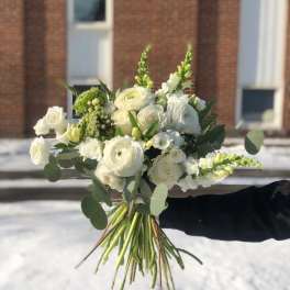White bouquet with round blooms and green accents