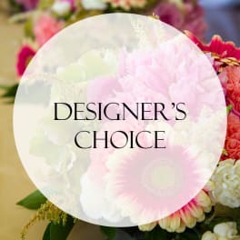 Pastel mixed flower arrangement with pink gerbera daisies and white blooms