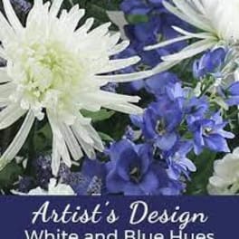 White and blue flower arrangement with large daisy-like blooms