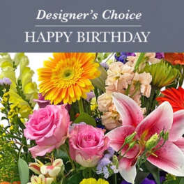Mixed bouquet with pink roses, lilies, and a yellow gerbera daisy