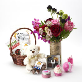 Market arrangement with Local Chocolate and Local Bath / Spa products