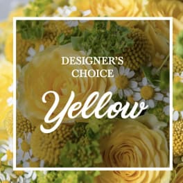 Yellow roses and small white daisies with green filler