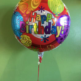 Round birthday balloon with colorful "Happy Birthday!" text
